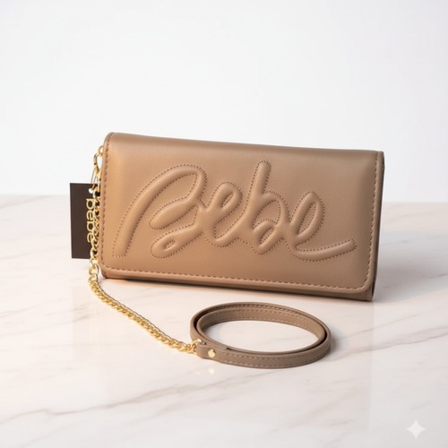 Bebe taupe wristlet wallet - elegant editorial shot on marble surface