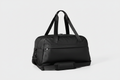 All In Motion black duffle bag with studio lighting on clean background