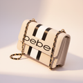 Bebe cream and black stripe crossbody bag - glamorous editorial shot