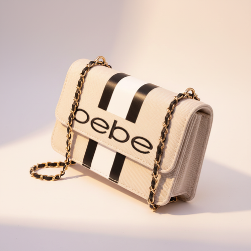 Bebe cream and black stripe crossbody bag - glamorous editorial shot