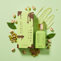 Éclait Pistalush EDP fun photo with scattered pistachios and cream drizzle