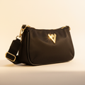 Valentino Orlandi black vegan leather crossbody bag - bright glamorous editorial shot
