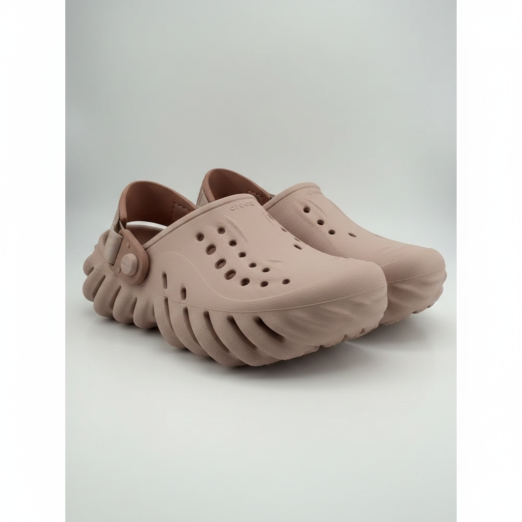 Crocs Echo Clog K in dusty rose pink kids size J1 on white background with studio lighting